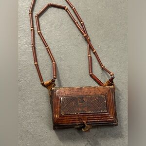1980s Vintage Handmade Distressed Leather African Bag With Beaded Strap